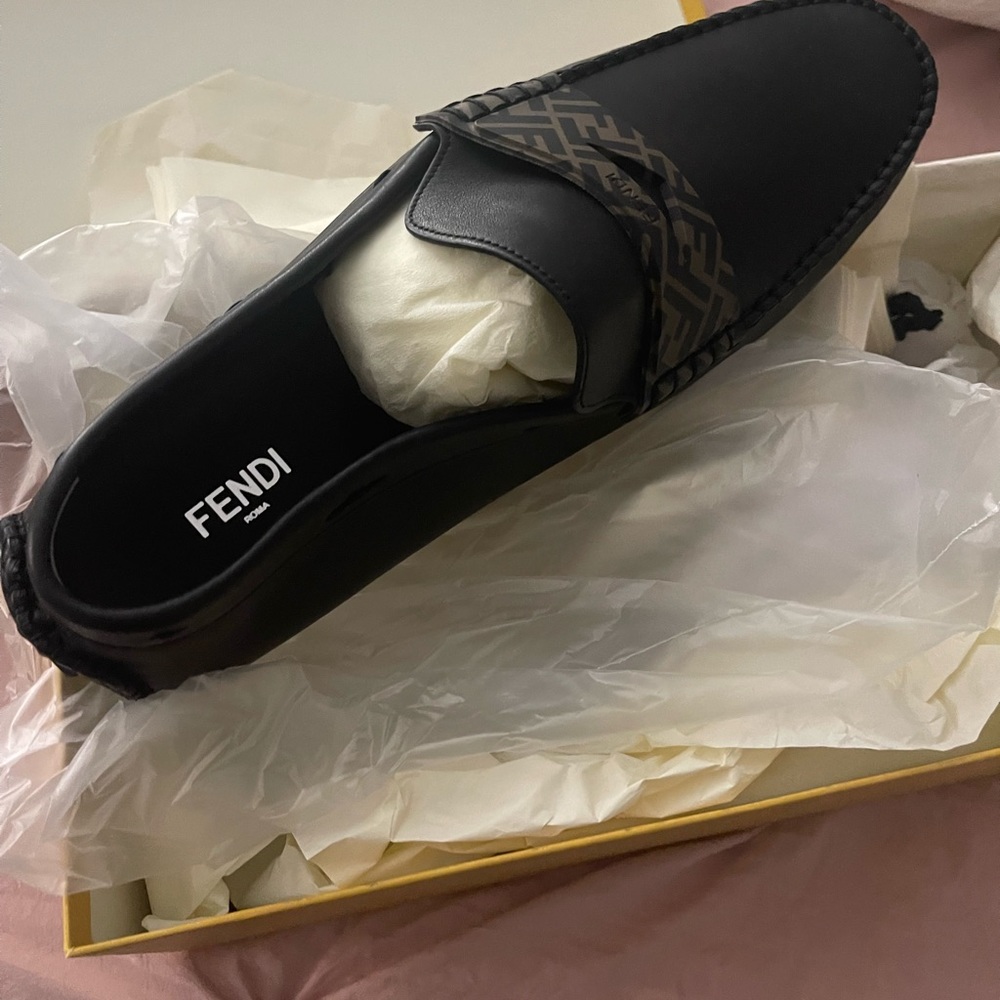 Brand new men Fendi size 10 cut big so really wear a 11